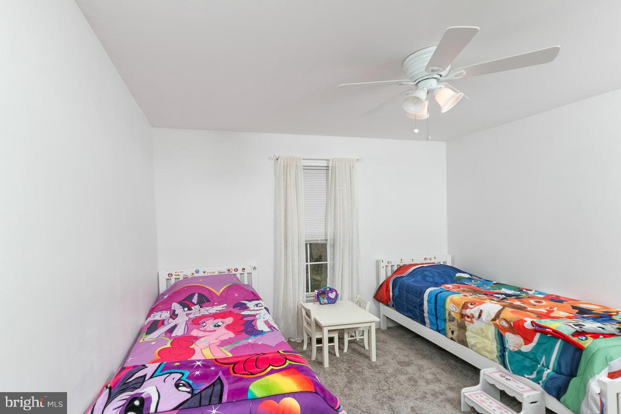 3726 Grave Run Road Hampstead, MD 21074 - Photo 16 of 30 a bedroom with two beds and painted walls