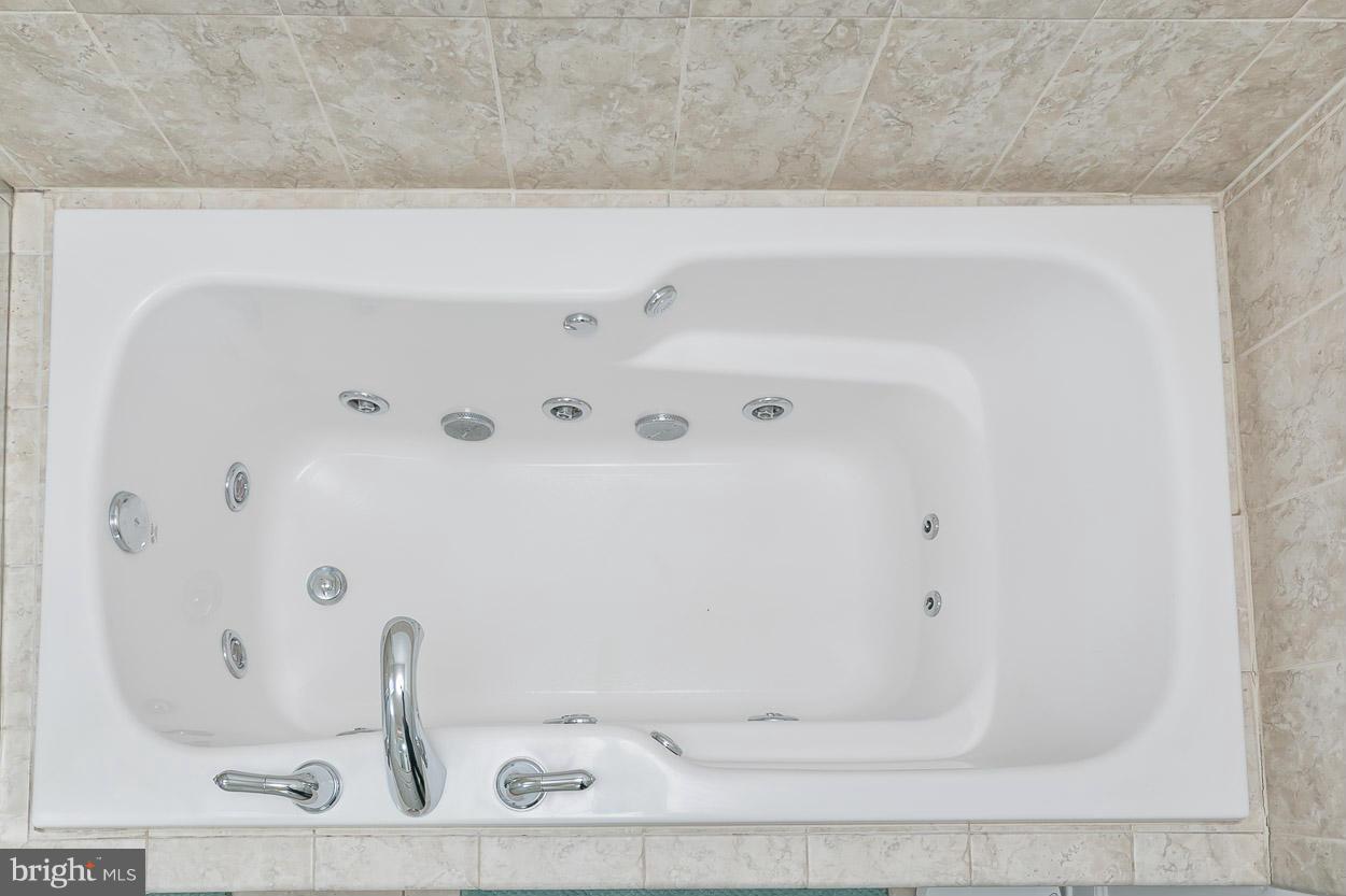 3726 Grave Run Road Hampstead, MD 21074 - Photo 21 of 30 a bathroom with a bathtub
