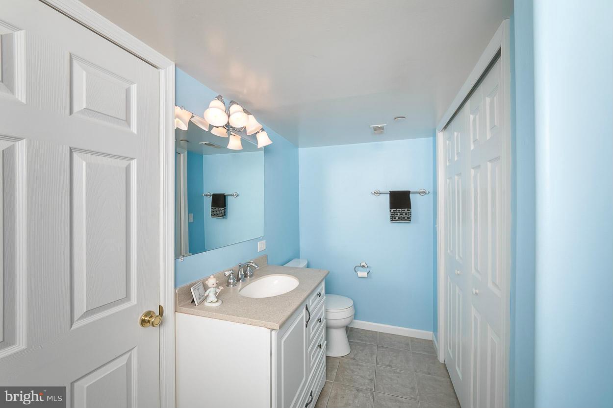 3726 Grave Run Road Hampstead, MD 21074 - Photo 23 of 30 a bathroom with a sink toilet and shower