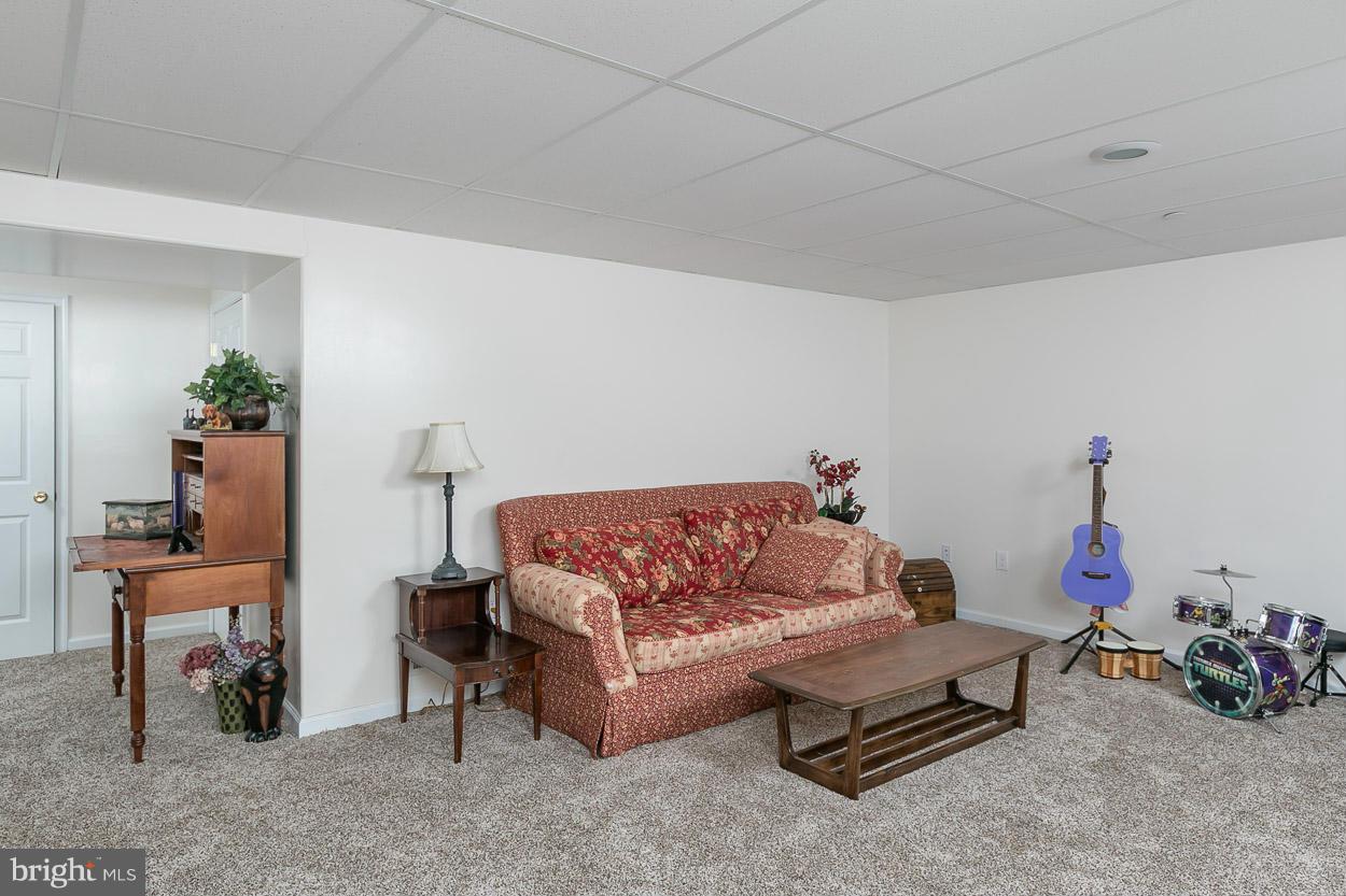 3726 Grave Run Road Hampstead, MD 21074 - Photo 27 of 30 a living room with furniture and a couch