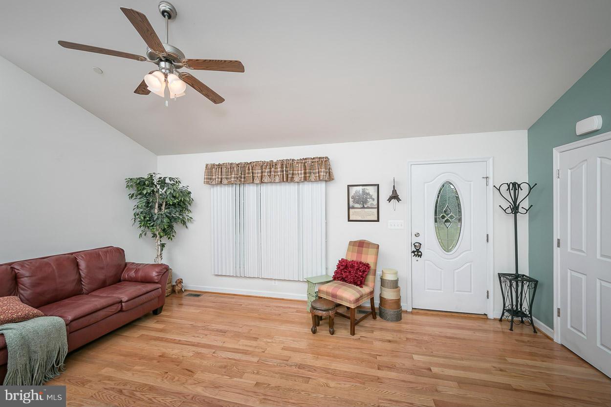 3726 Grave Run Road Hampstead, MD 21074 - Photo 5 of 30 a living room with furniture