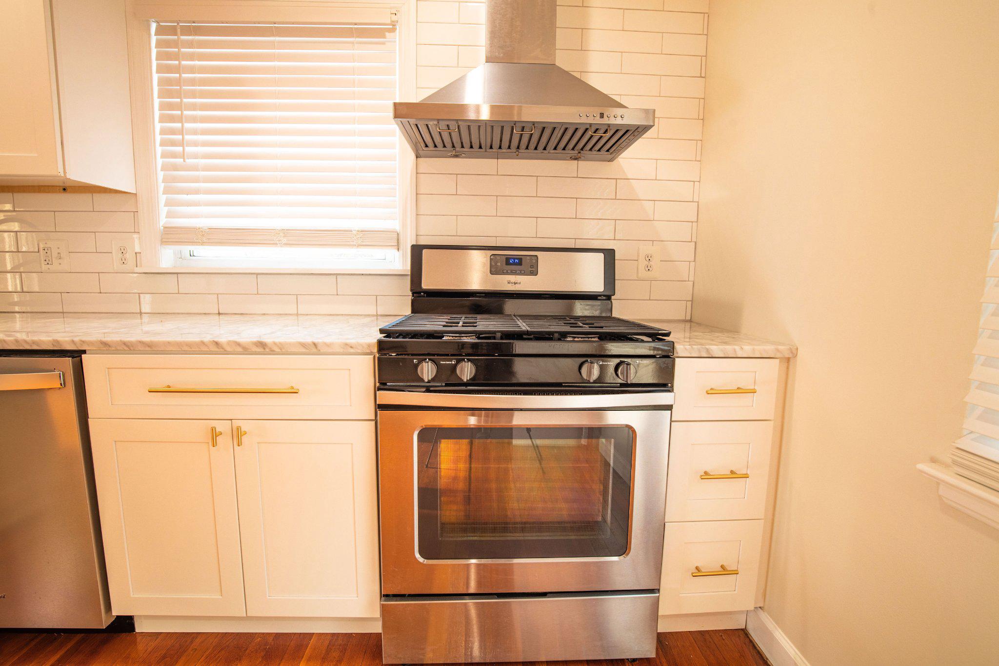 5810 Greenleaf Road Cheverly, MD 20785 - Photo 10 of 29 Modern kitchen with sleek appliances.
