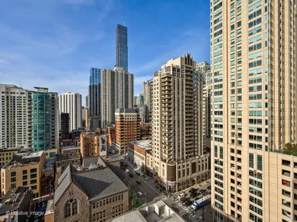 a view of buildings with a street