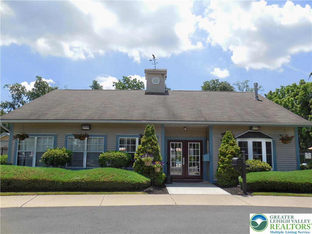 112 Freedom Court Bethlehem, PA 18020 - Photo 11 of 16 a front view of a house with a garden