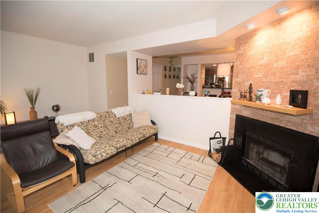 112 Freedom Court Bethlehem, PA 18020 - Photo 5 of 16 a living room with furniture and a fireplace