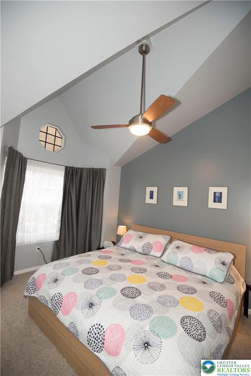 112 Freedom Court Bethlehem, PA 18020 - Photo 7 of 16 a bed sitting in a bedroom and a window