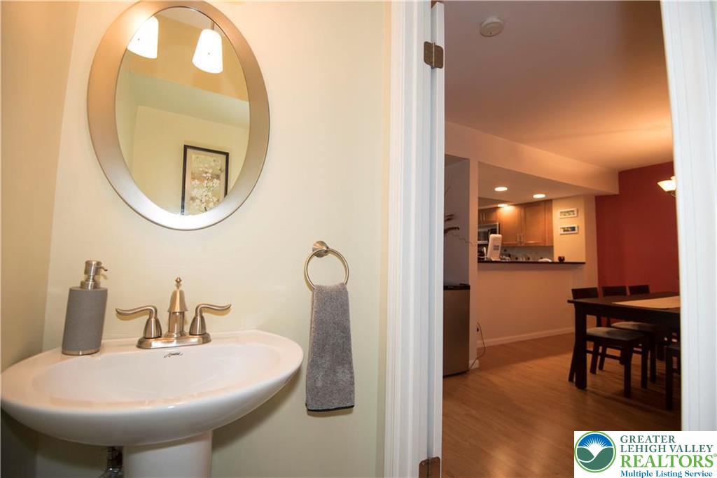112 Freedom Court Bethlehem, PA 18020 - Photo 10 of 16 a bathroom with a sink and a mirror