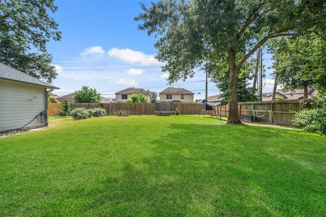 a view of a backyard with a garden