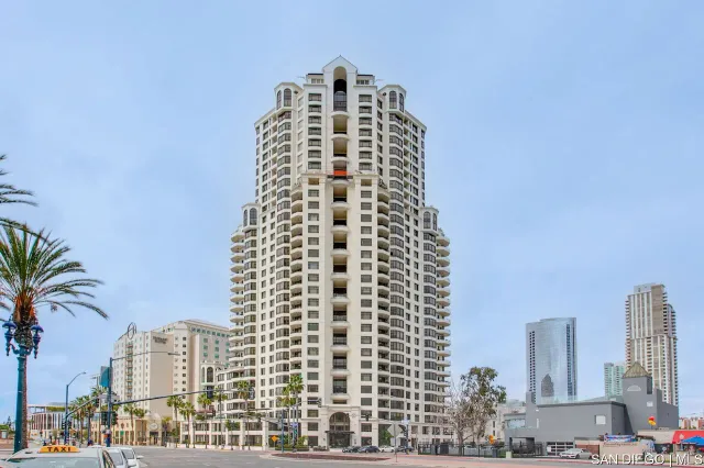 a view of a city with tall buildings