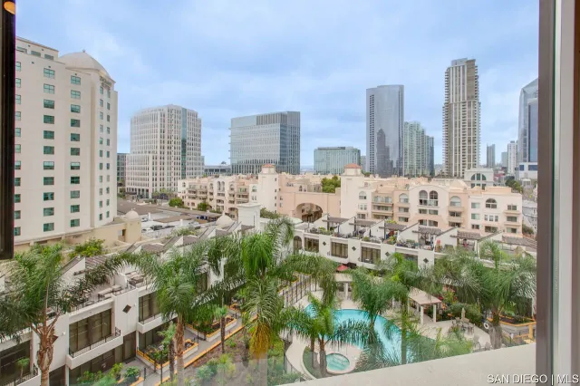 a view of a city with tall buildings