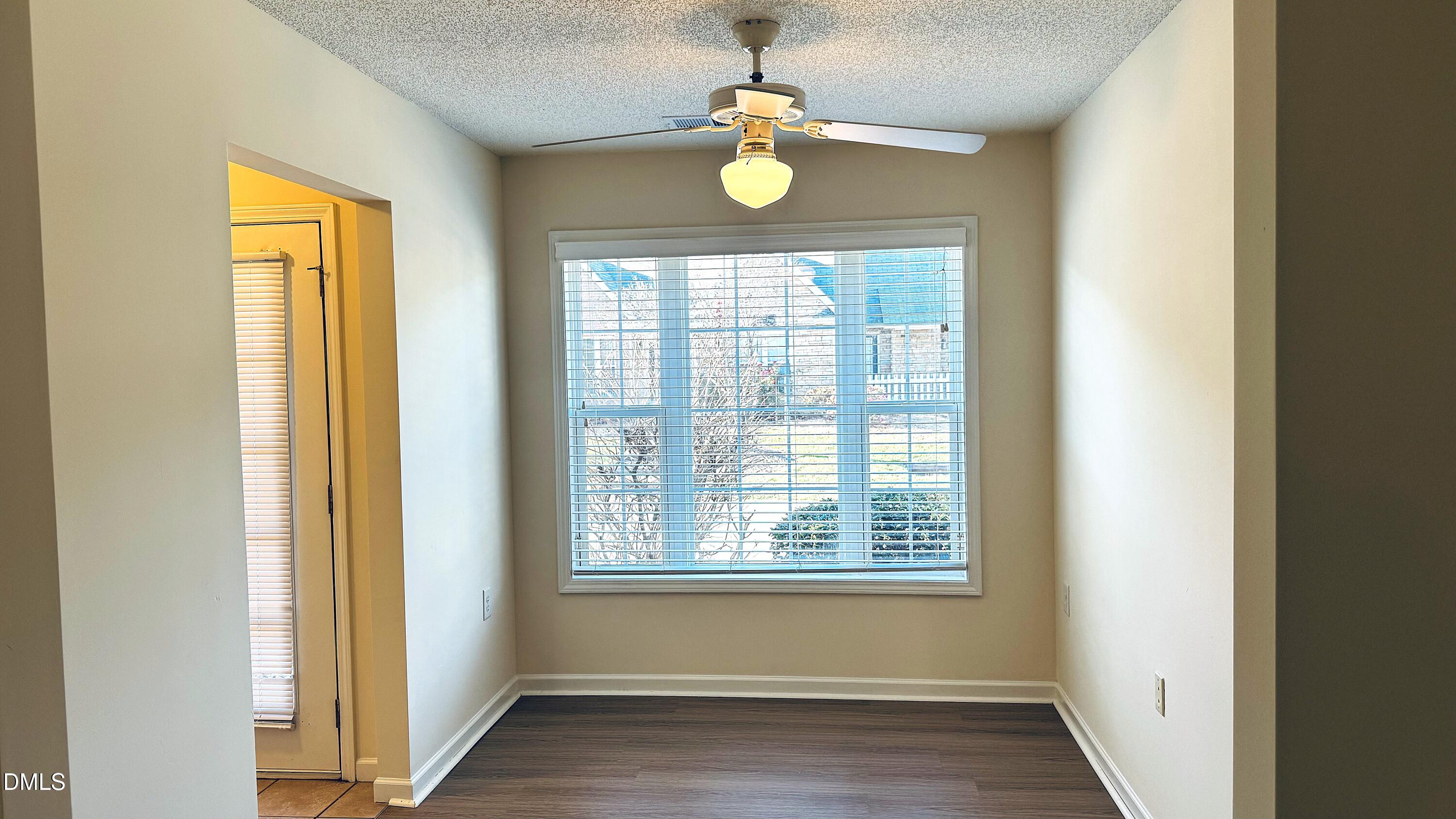 11320 Clubhaven Place, Unit 103 Raleigh, NC 27617 - Photo 3 of 13 a front view of a house with a window