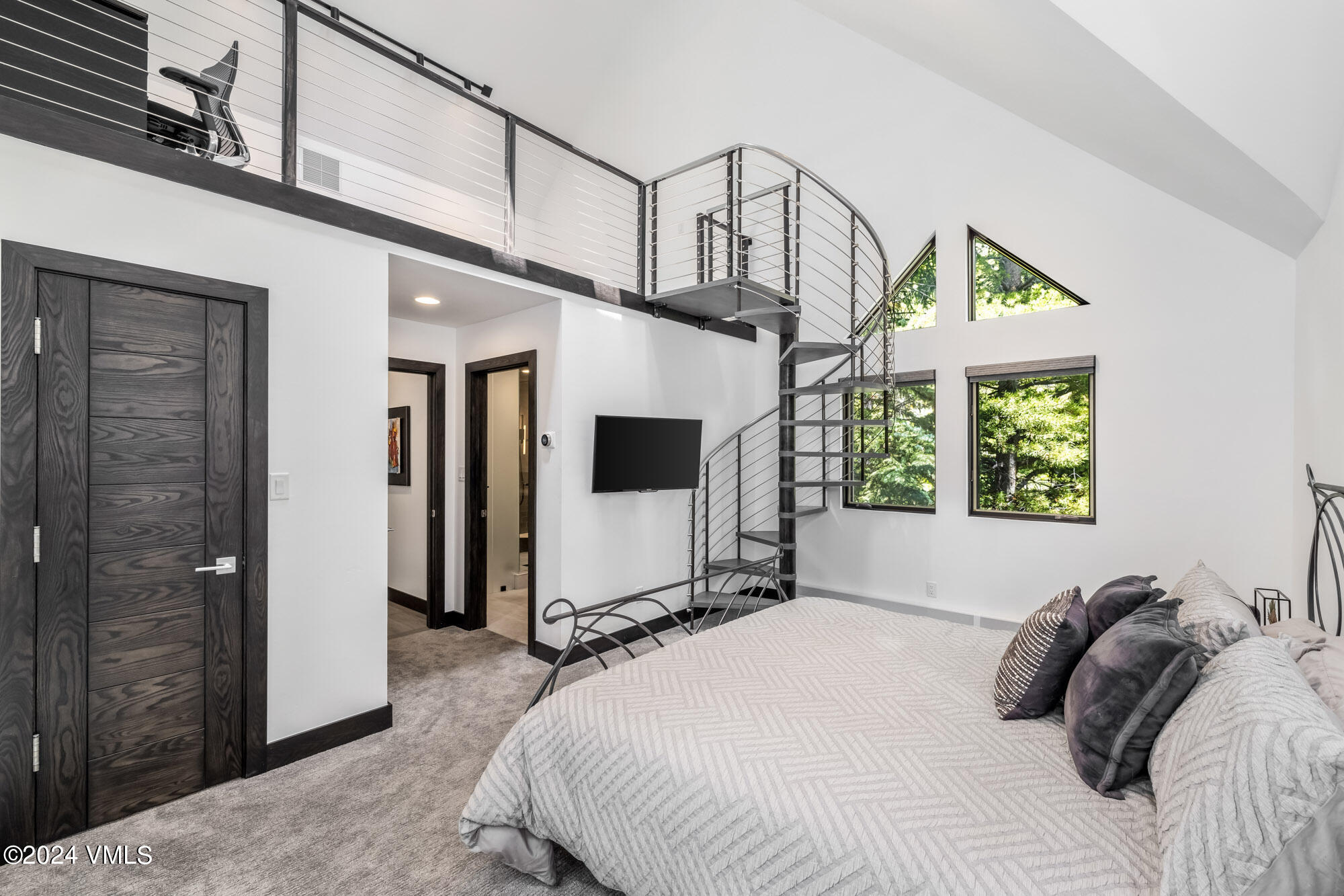 3891 Big Horn Road, Unit C Vail, CO 81657 - Photo 16 of 53 a bedroom with a bed and a window