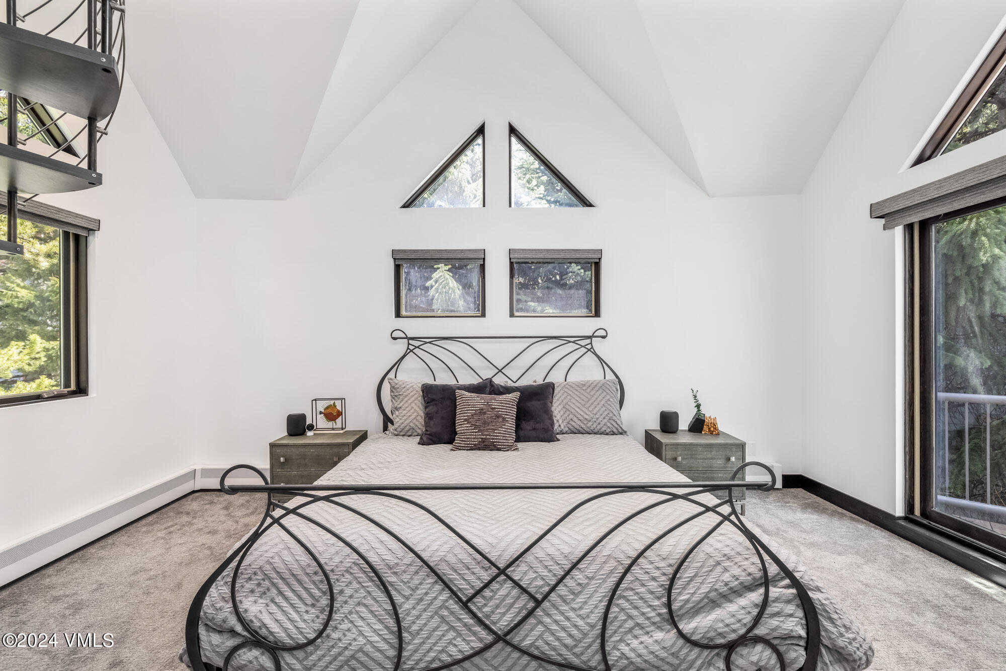 3891 Big Horn Road, Unit C Vail, CO 81657 - Photo 17 of 53 a bedroom with a bed and a window