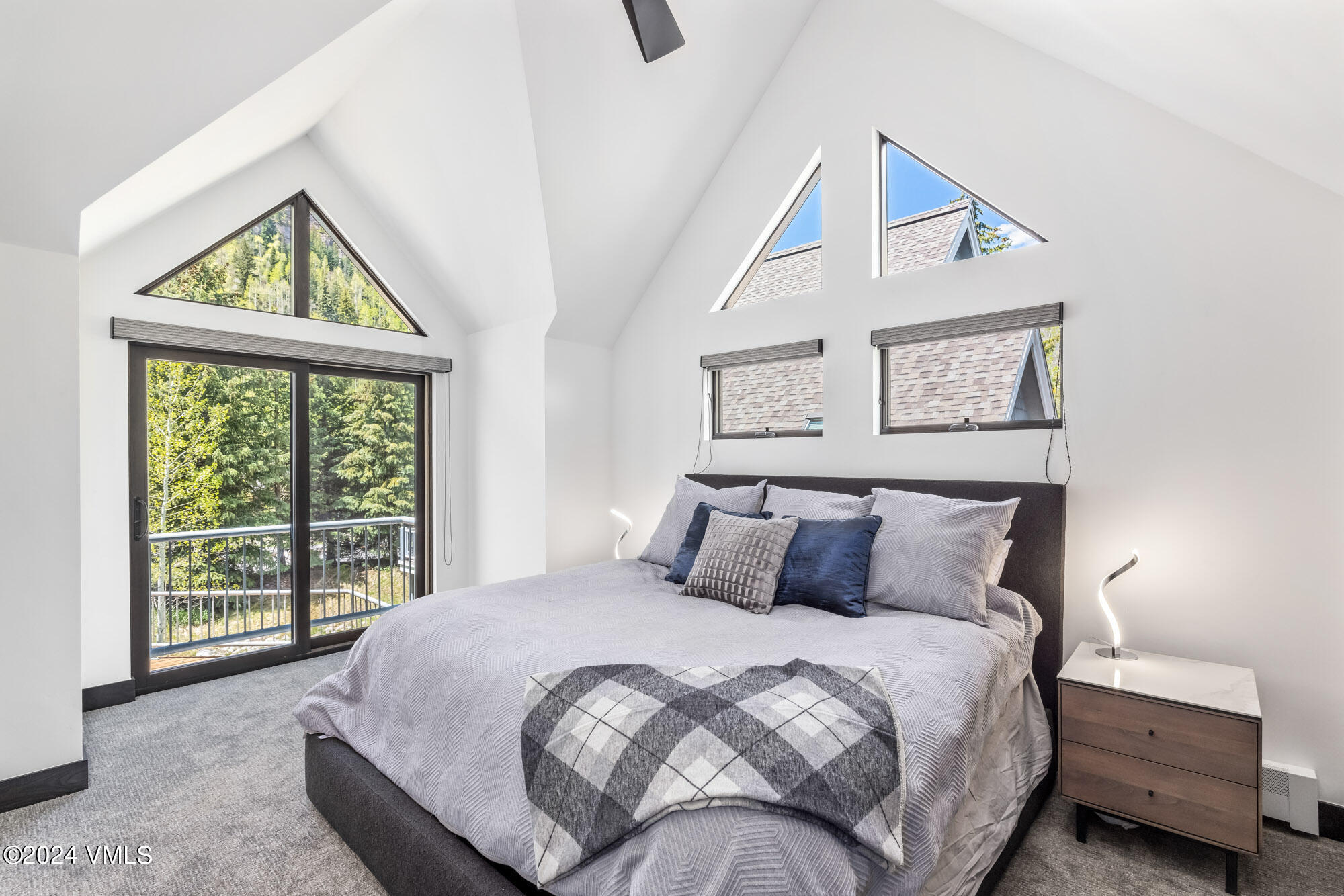 3891 Big Horn Road, Unit C Vail, CO 81657 - Photo 24 of 53 a bedroom with a bed and a window