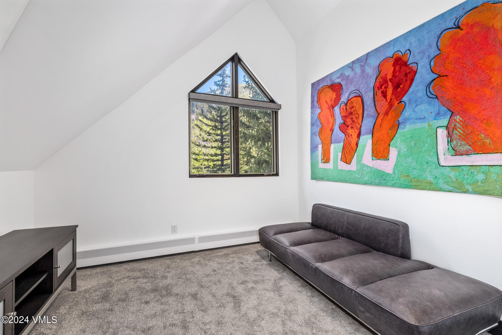3891 Big Horn Road, Unit C Vail, CO 81657 - Photo 29 of 53 a living room with furniture and a window