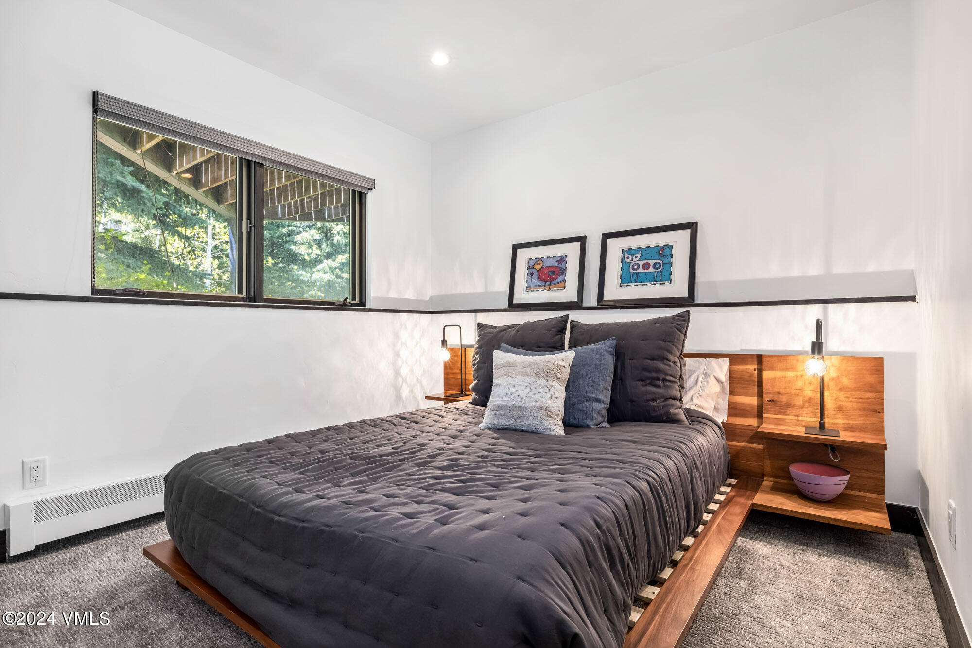 3891 Big Horn Road, Unit C Vail, CO 81657 - Photo 30 of 53 a bedroom with a bed and a window