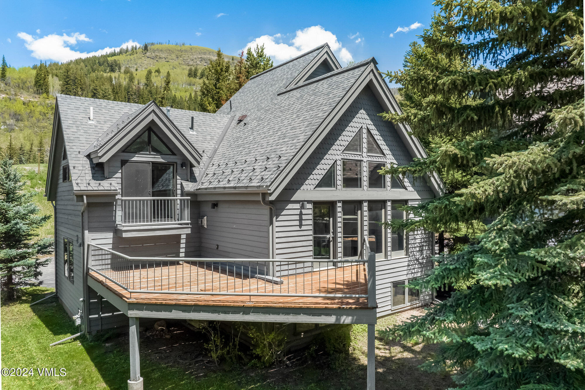 3891 Big Horn Road, Unit C Vail, CO 81657 - Photo 33 of 53 a front view of a house with a porch