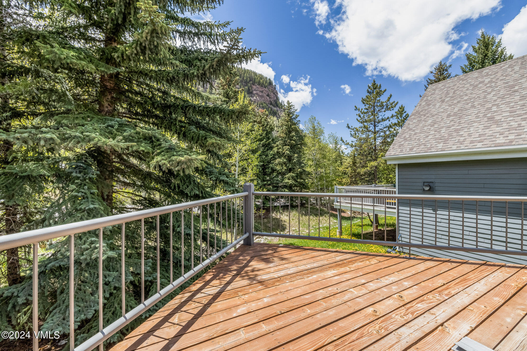 3891 Big Horn Road, Unit C Vail, CO 81657 - Photo 34 of 53 a view of balcony with wooden floor and fence