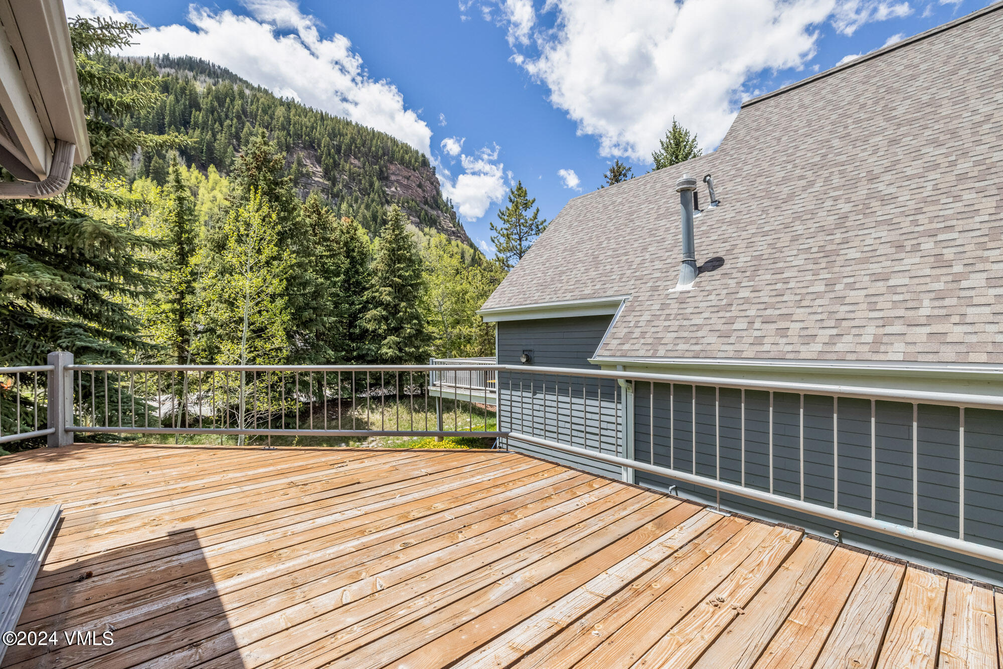 3891 Big Horn Road, Unit C Vail, CO 81657 - Photo 35 of 53 a view of balcony with deck and wooden floor