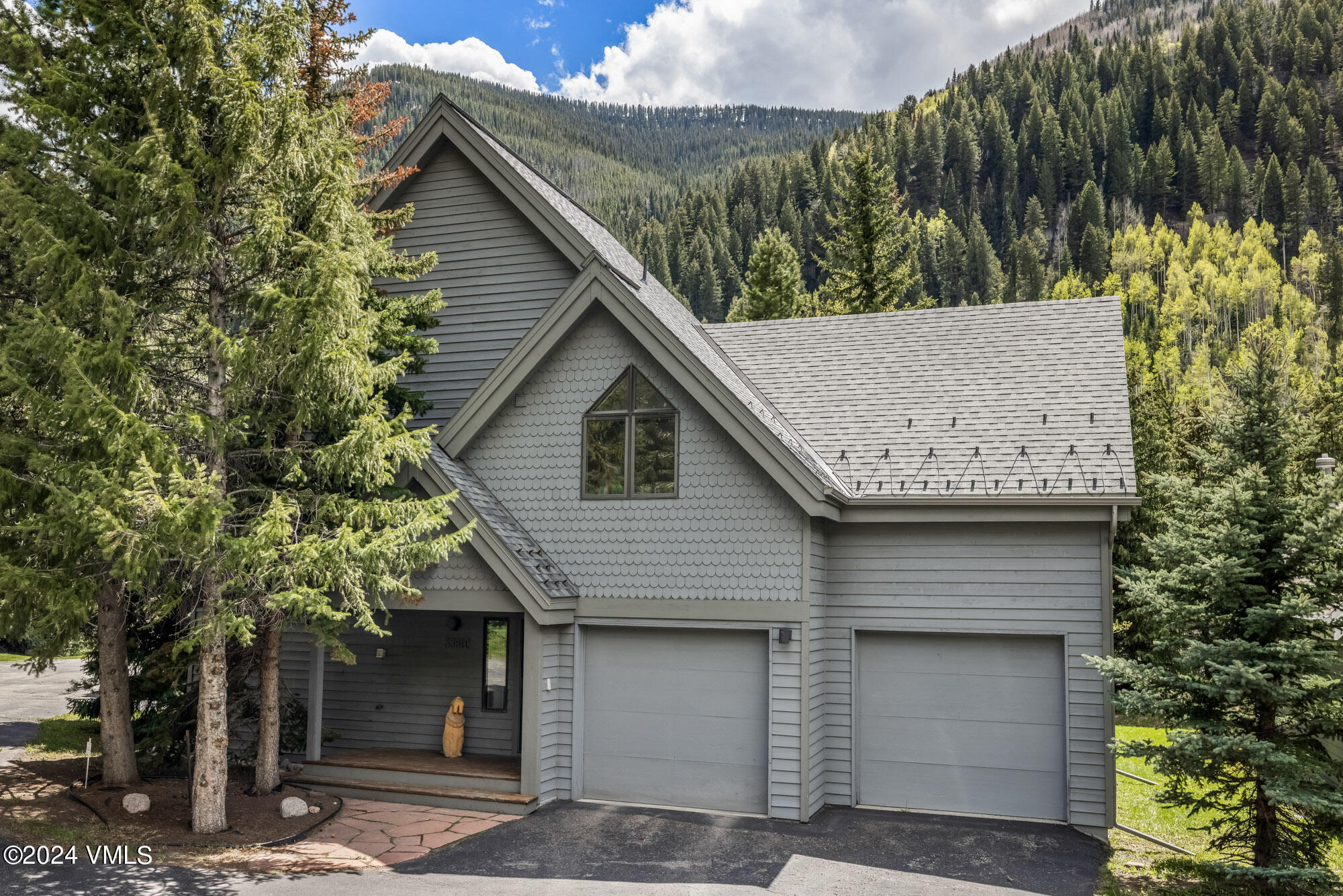 3891 Big Horn Road, Unit C Vail, CO 81657 - Photo 40 of 53 a view of a house with a tree