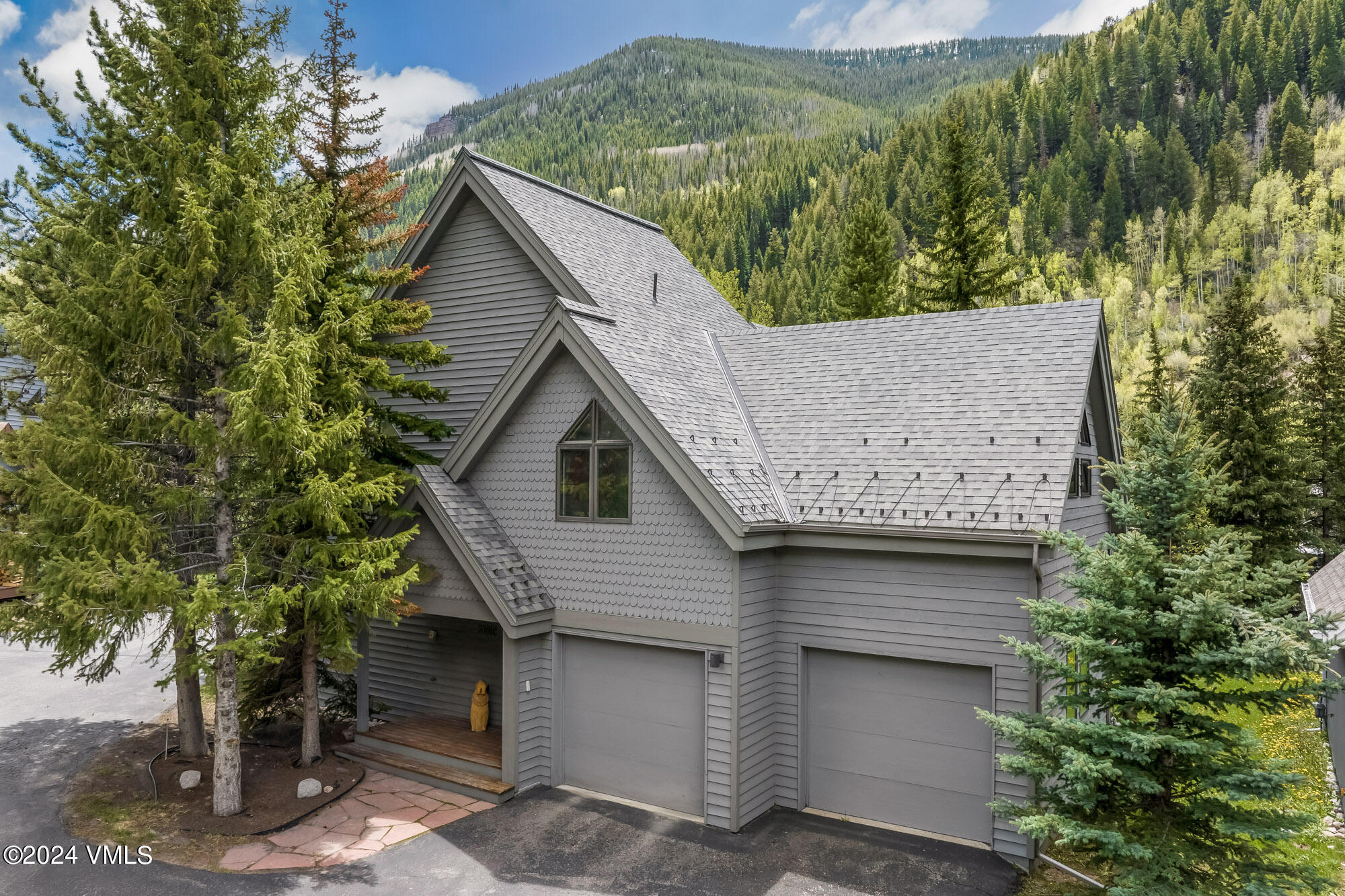 3891 Big Horn Road, Unit C Vail, CO 81657 - Photo 41 of 53 a aerial view of a house with a yard and garage