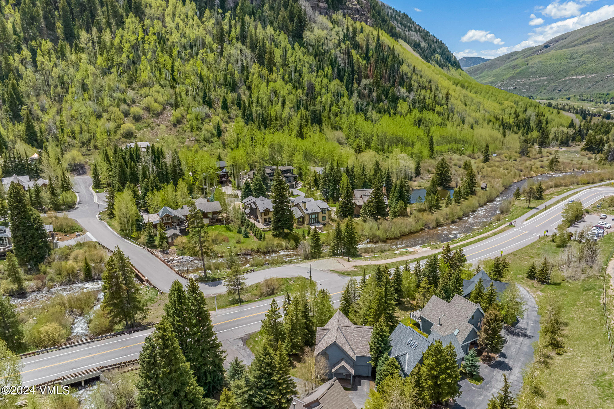 3891 Big Horn Road, Unit C Vail, CO 81657 - Photo 46 of 53 a view of a lake with a yard