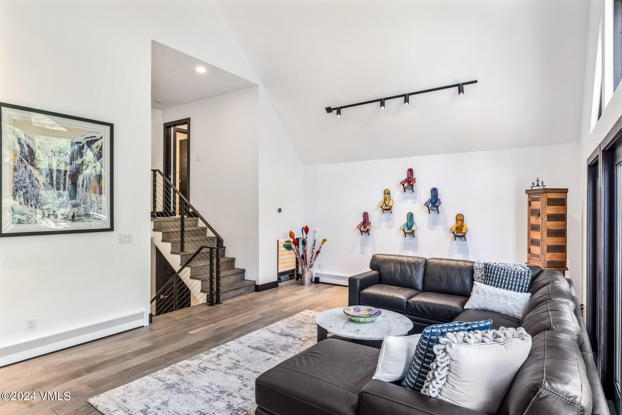 3891 Big Horn Road, Unit C Vail, CO 81657 - Photo 6 of 53 a living room with furniture and a wooden floor