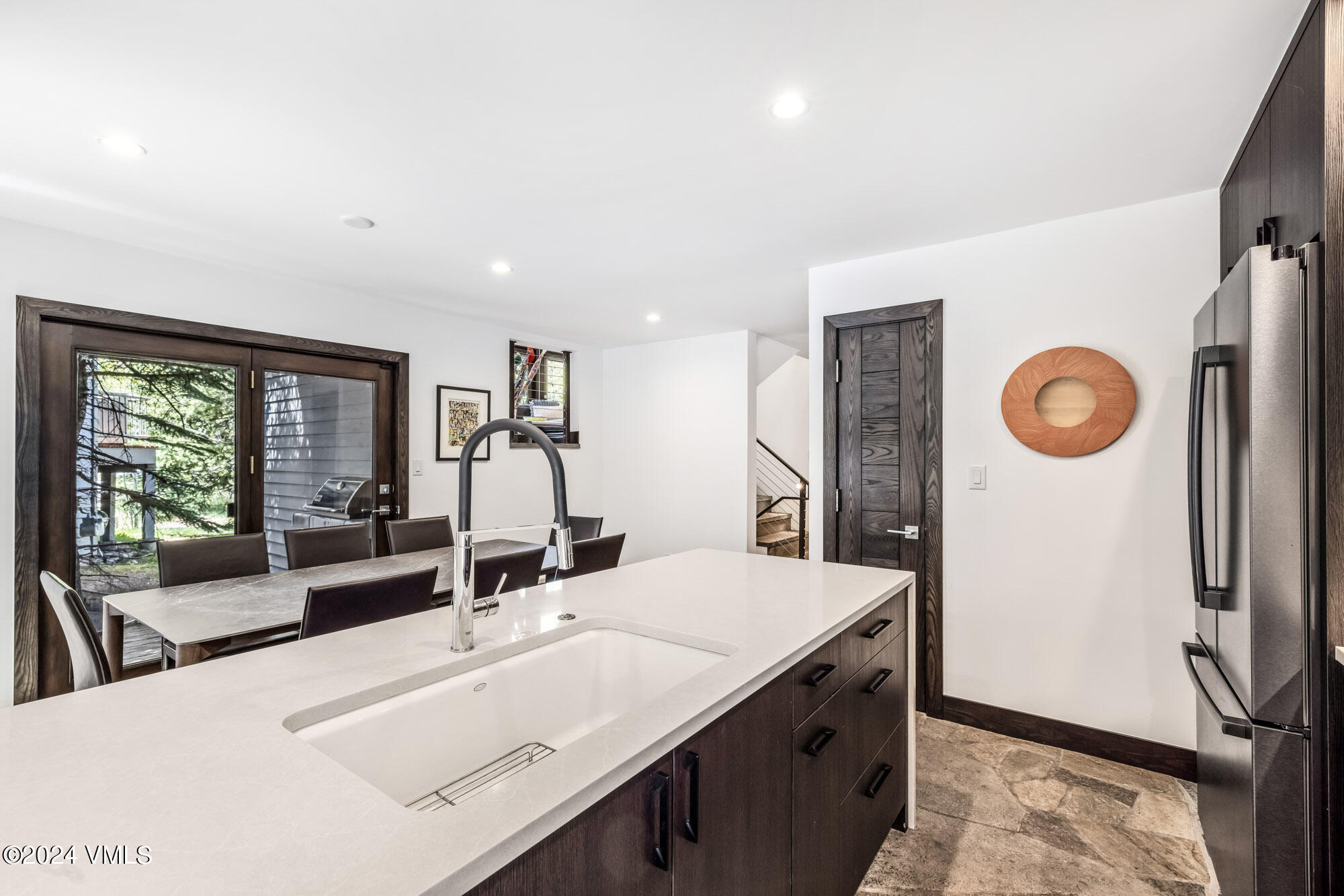 3891 Big Horn Road, Unit C Vail, CO 81657 - Photo 10 of 53 a bathroom with a sink and a large mirror