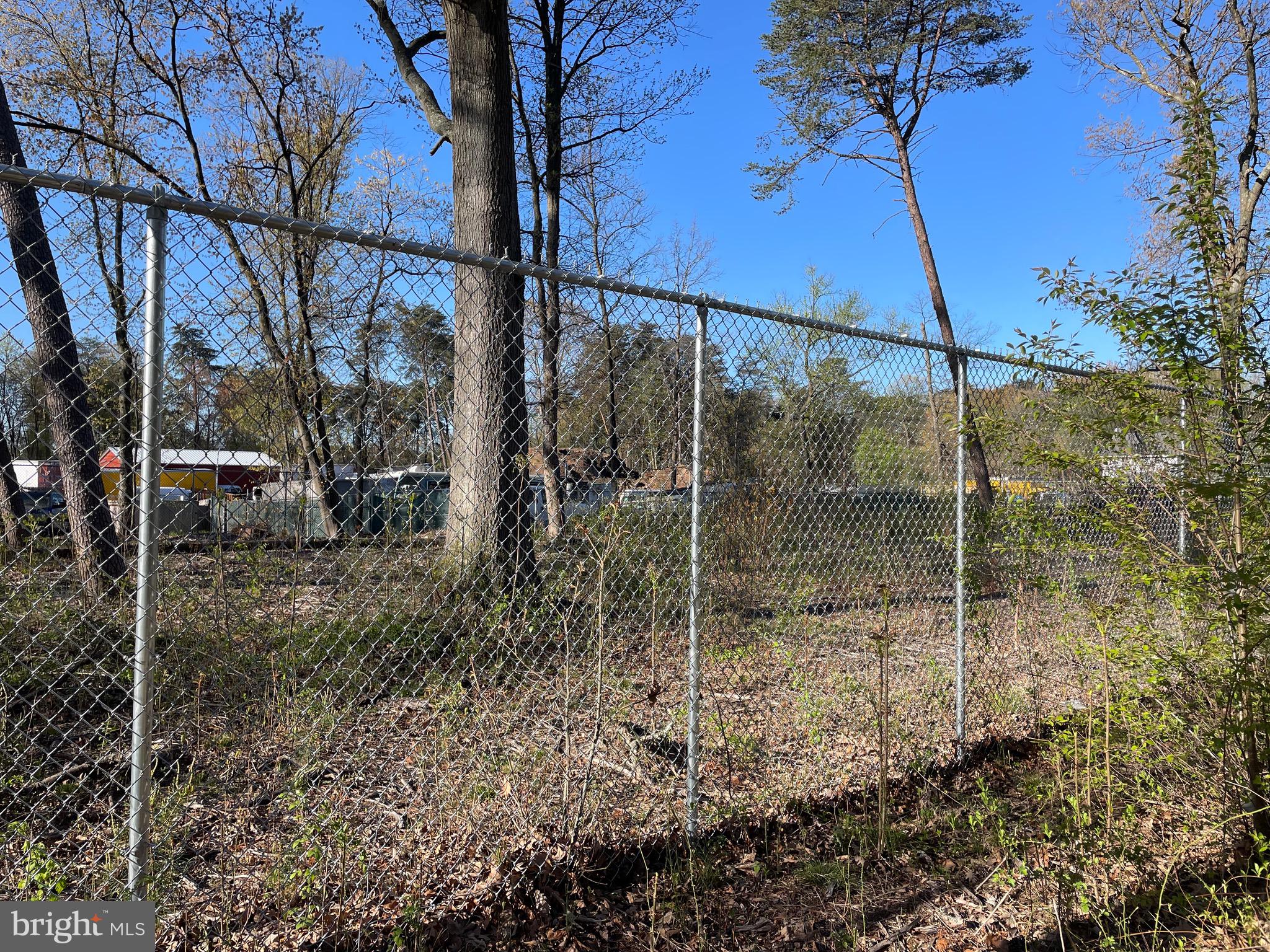 0 Bertram Drive Glen Burnie, MD 21061 - Photo 4 of 6 a backyard of a house with lots of green space