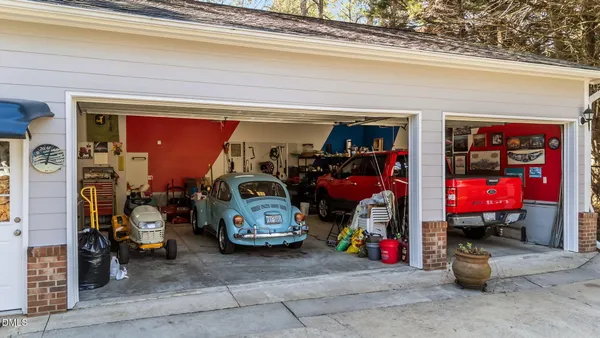 a view of a garage with a lot of stuff