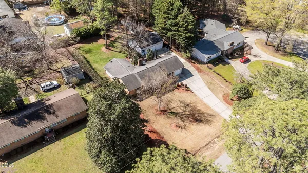an aerial view of residential house with outdoor space