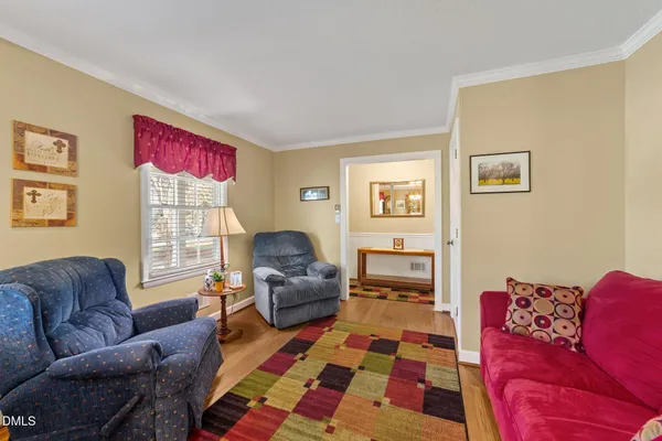 a living room with furniture and a couch