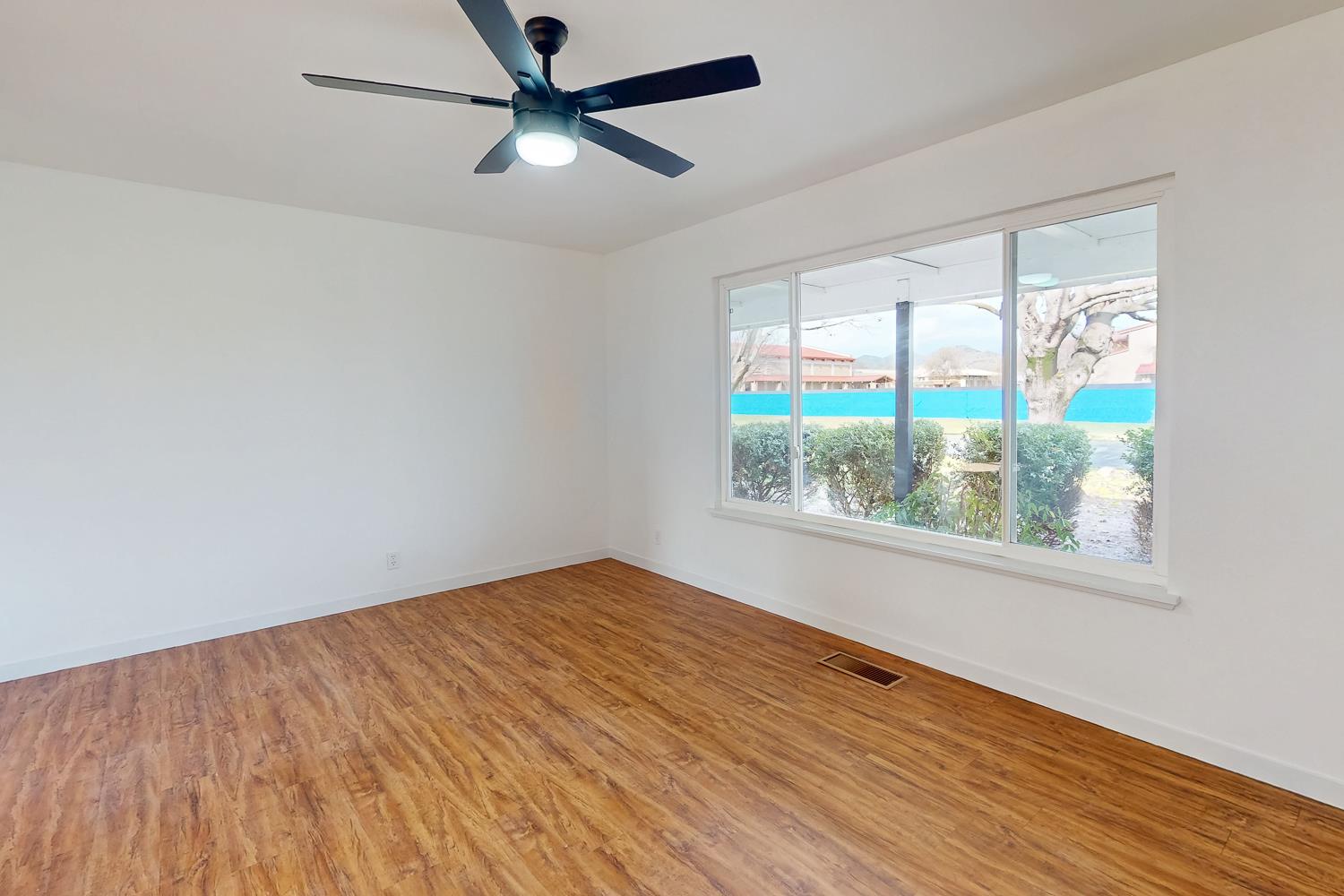 7830 Griffith Lane Sutter, CA 95982 - Photo 20 of 69 wooden floor in an empty room with a window