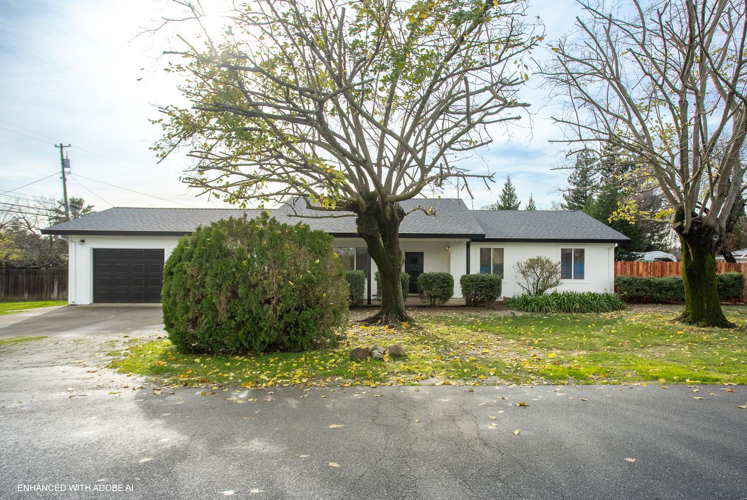 7830 Griffith Lane Sutter, CA 95982 - Photo 3 of 69 a front view of a house with yard and trees
