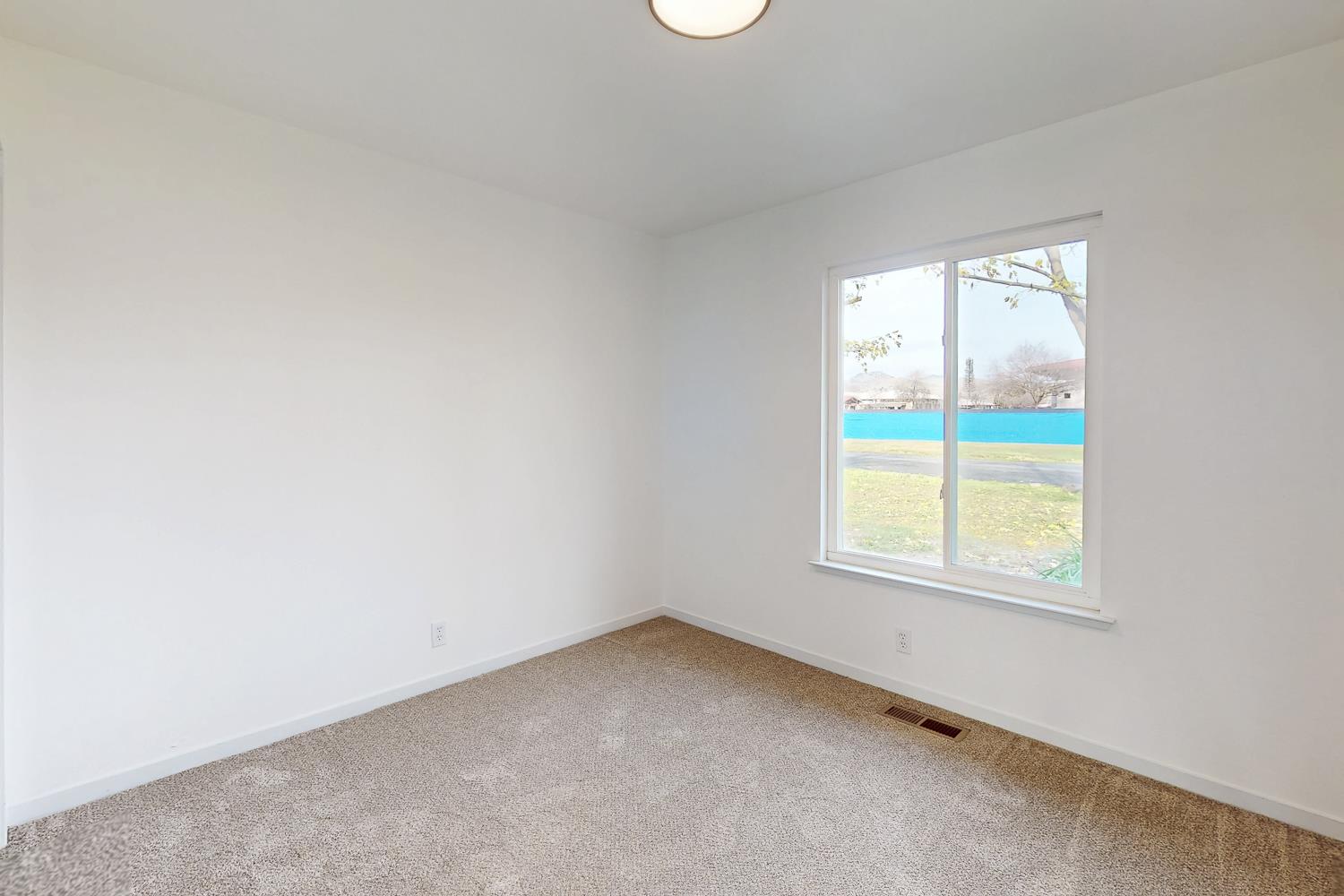 7830 Griffith Lane Sutter, CA 95982 - Photo 32 of 69 an empty room with a window