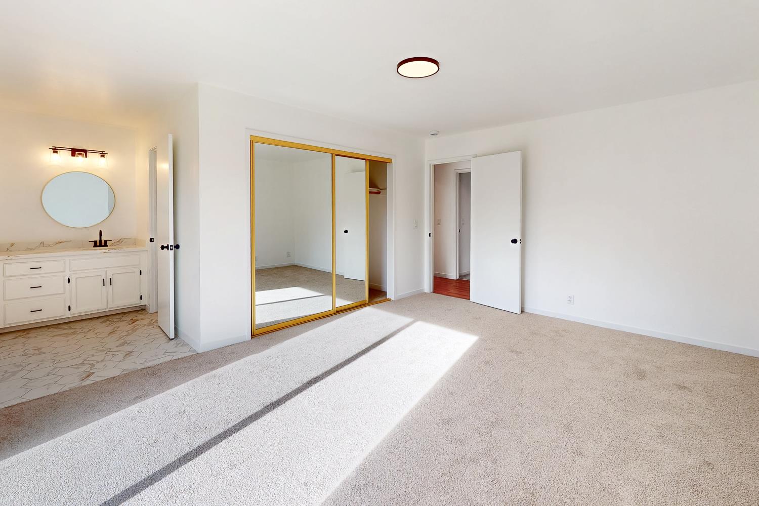 7830 Griffith Lane Sutter, CA 95982 - Photo 38 of 69 a bedroom with a bed and a mirror