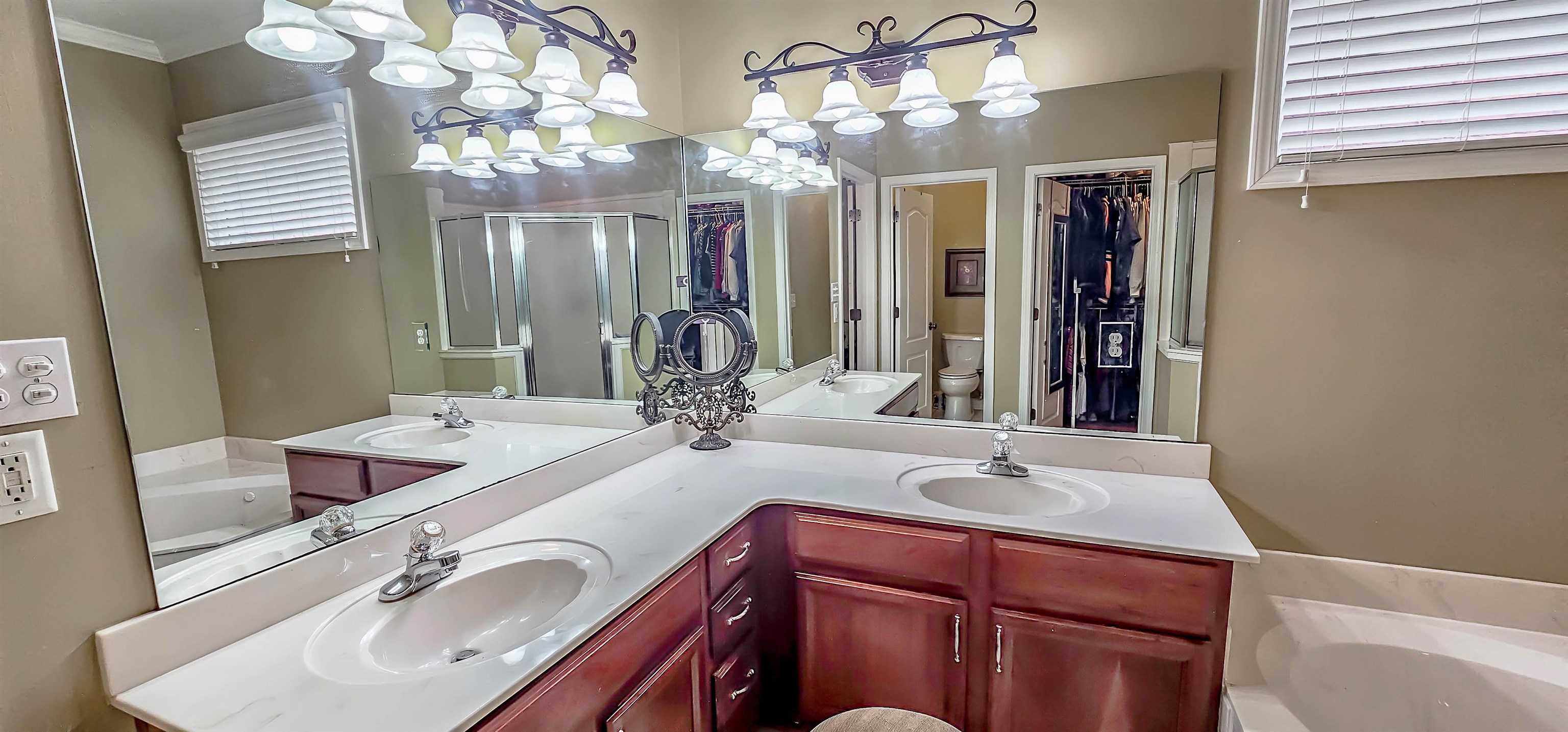 824 McFerrin Lane Collierville, TN 38017 - Photo 13 of 25 Full bathroom featuring a garden tub, a spacious closet, a stall shower, and double vanity