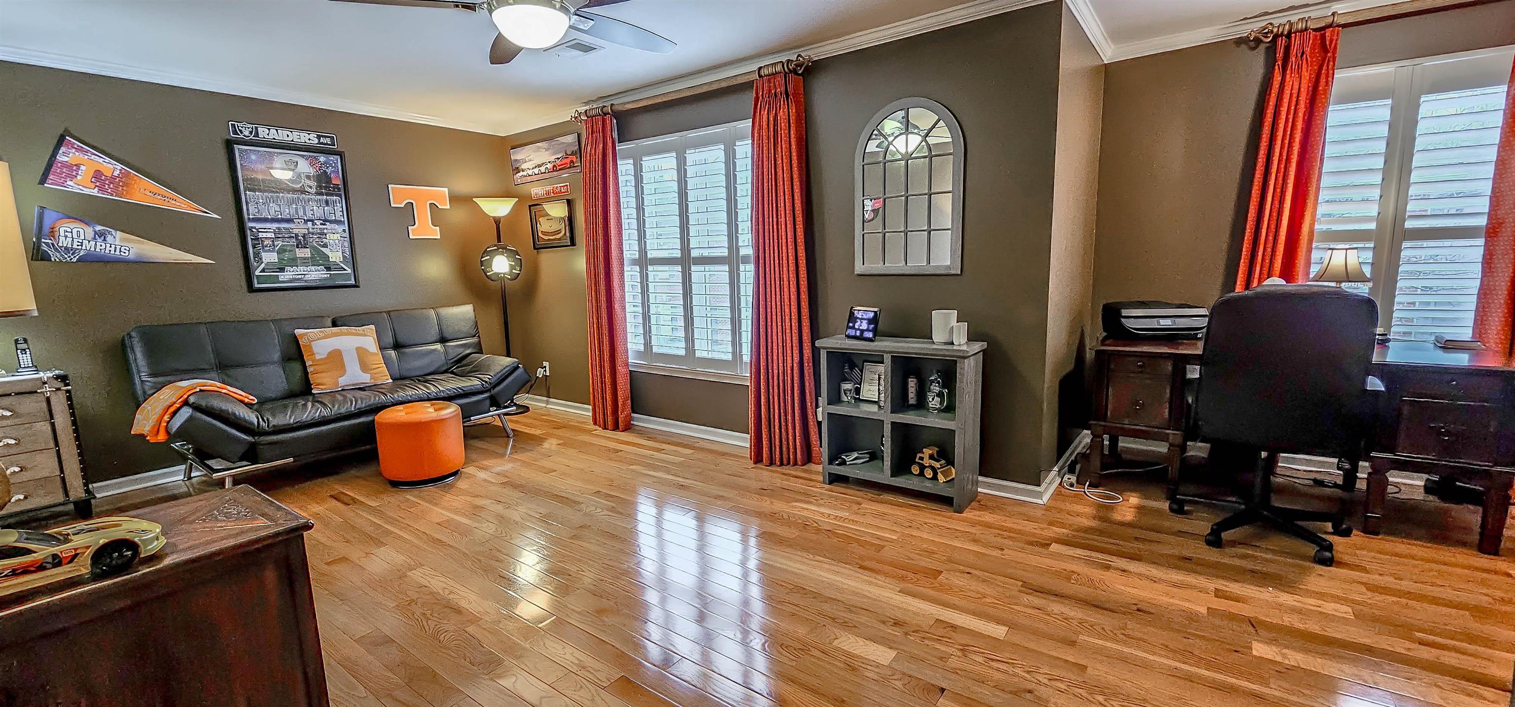 824 McFerrin Lane Collierville, TN 38017 - Photo 19 of 25 Featuring ornamental molding, light wood-style flooring, and ceiling fan. Could be used as office or mancave