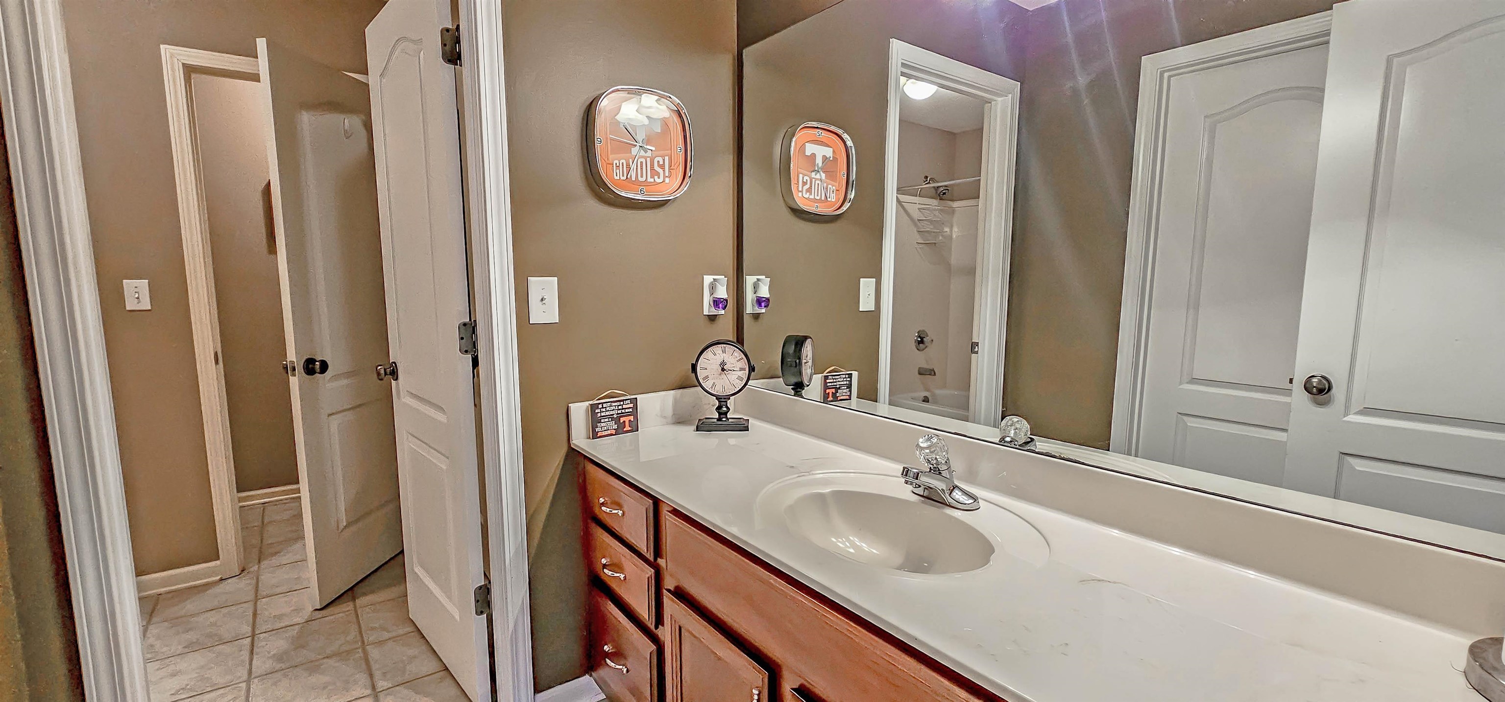 824 McFerrin Lane Collierville, TN 38017 - Photo 21 of 25 Bathroom featuring vanity, bathing tub / shower combination, and light tile patterned flooring