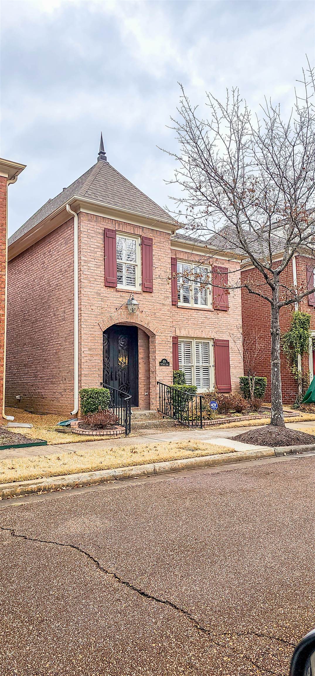 824 McFerrin Lane Collierville, TN 38017 - Photo 24 of 25 View of front of home with brick siding and a shingled roof