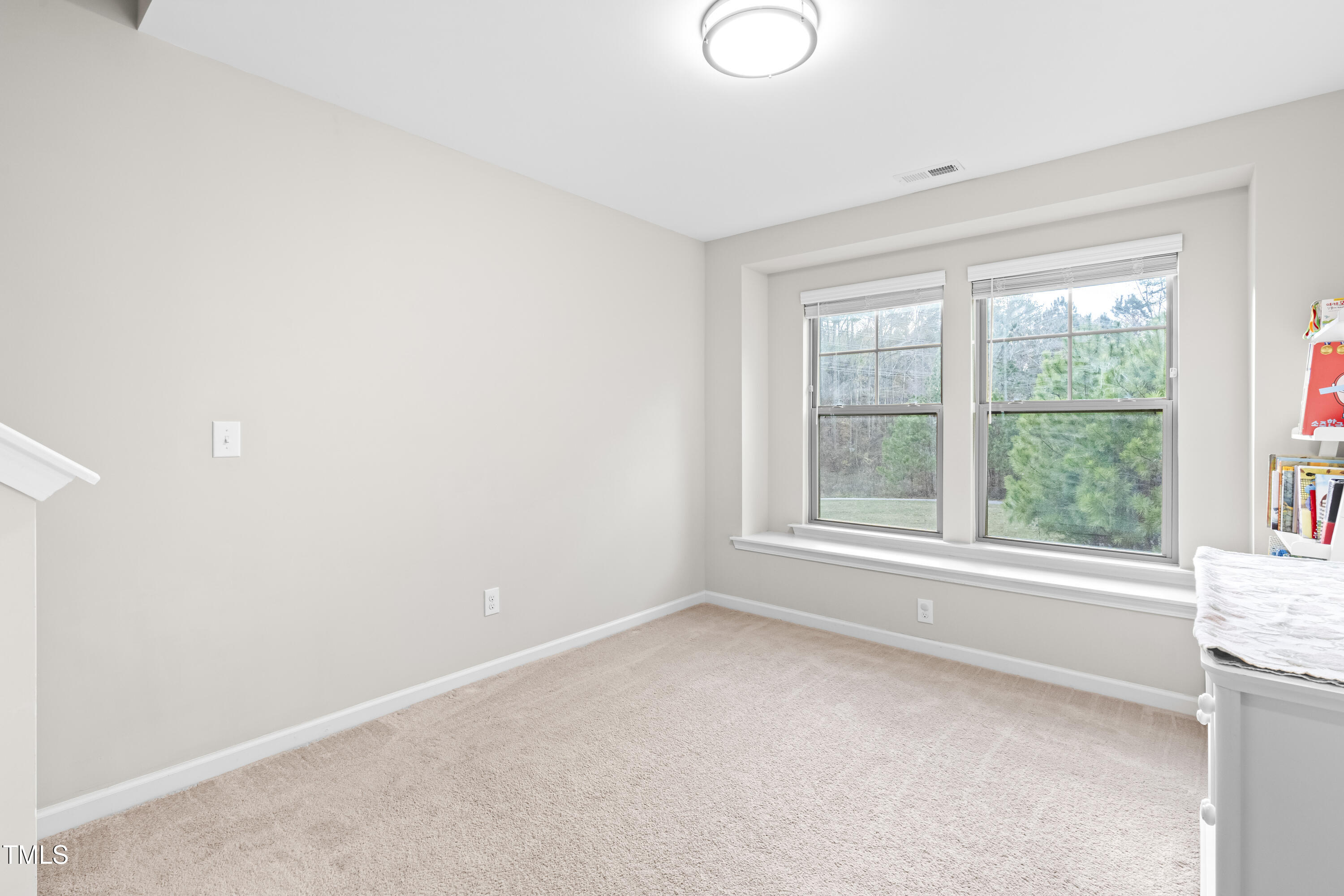 1004 Metropolitan Drive Durham, NC 27713 - Photo 13 of 28 a view of an empty room with a window
