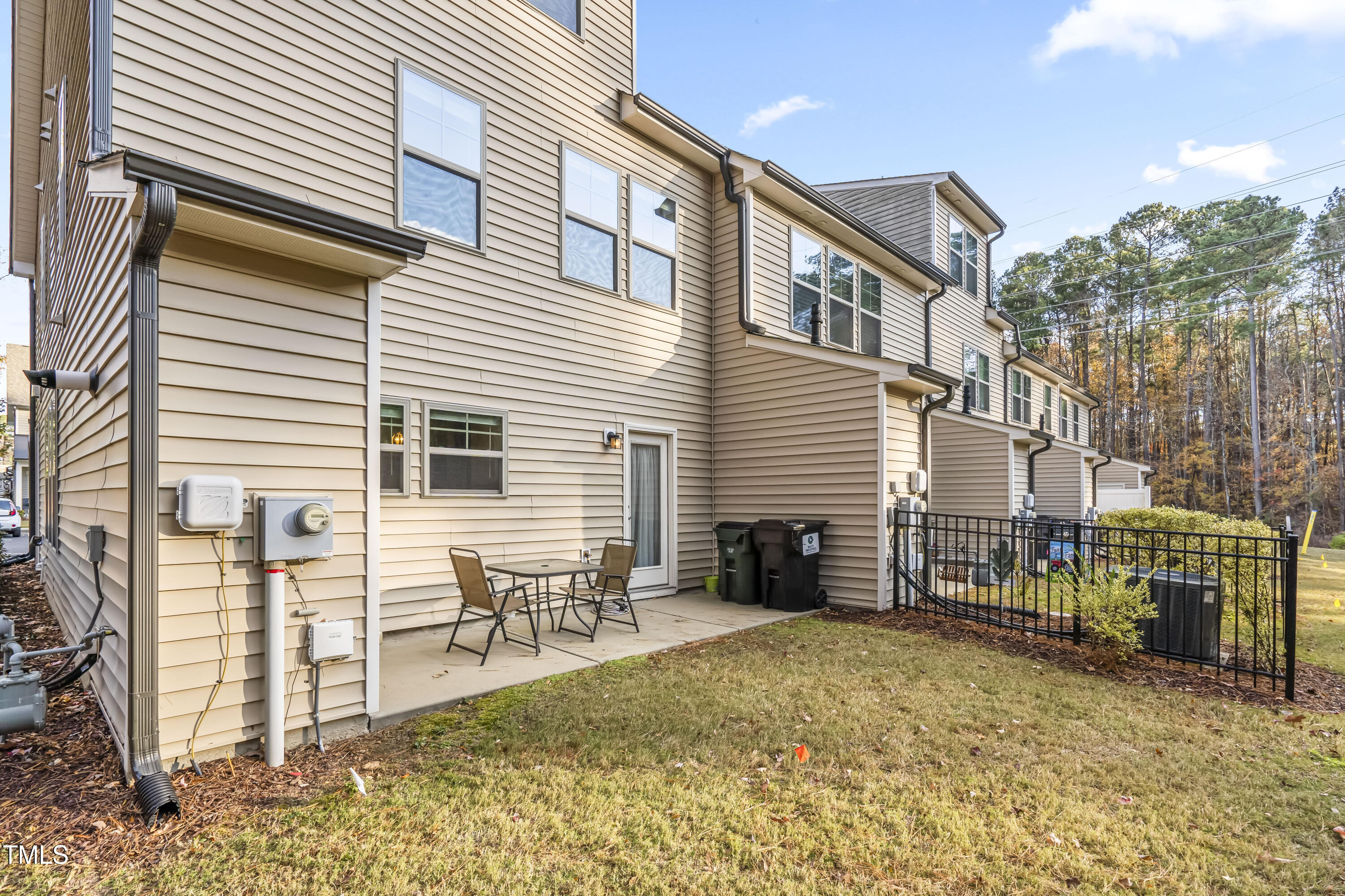 1004 Metropolitan Drive Durham, NC 27713 - Photo 20 of 28 a view of a house with a wooden deck