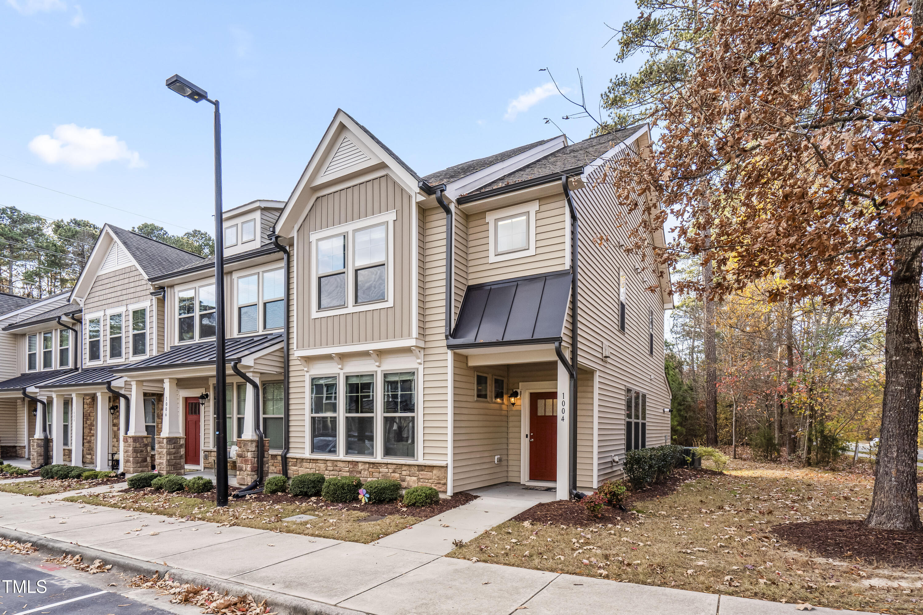 1004 Metropolitan Drive Durham, NC 27713 - Photo 2 of 28 a front view of a house with a yard