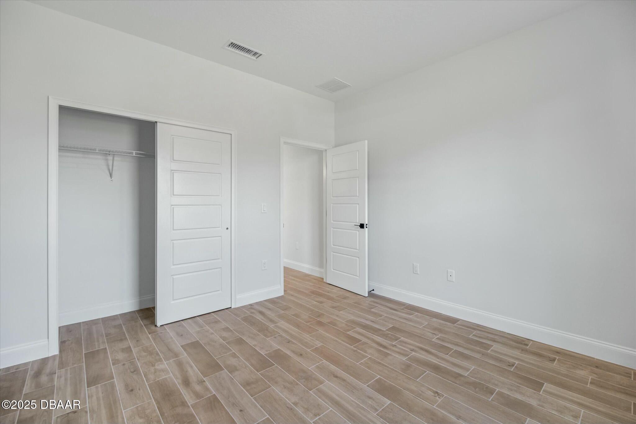 2 Seamanship Trail Palm Coast, FL 32164 - Photo 17 of 38 a view of an empty room