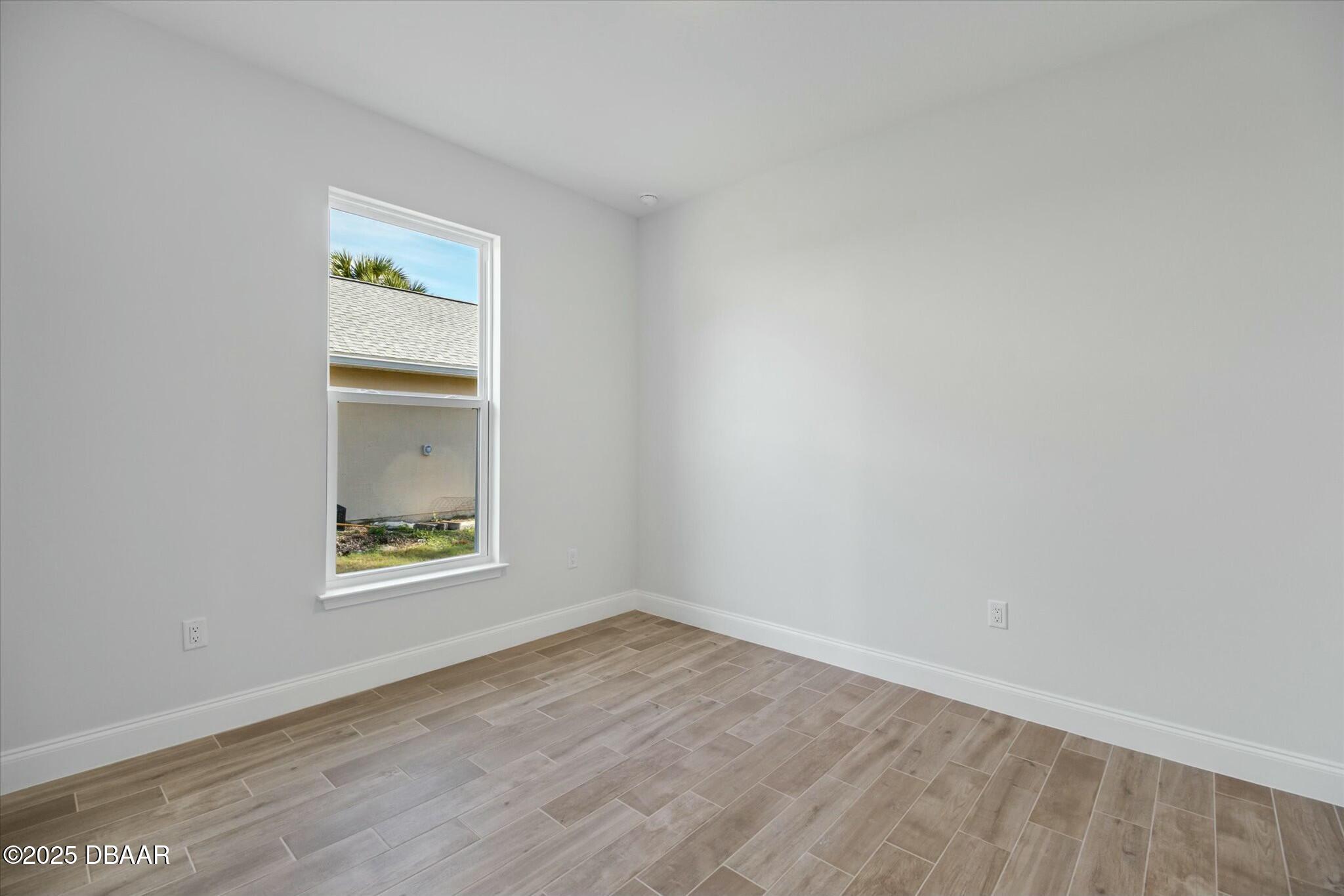 2 Seamanship Trail Palm Coast, FL 32164 - Photo 18 of 38 an empty room with a window
