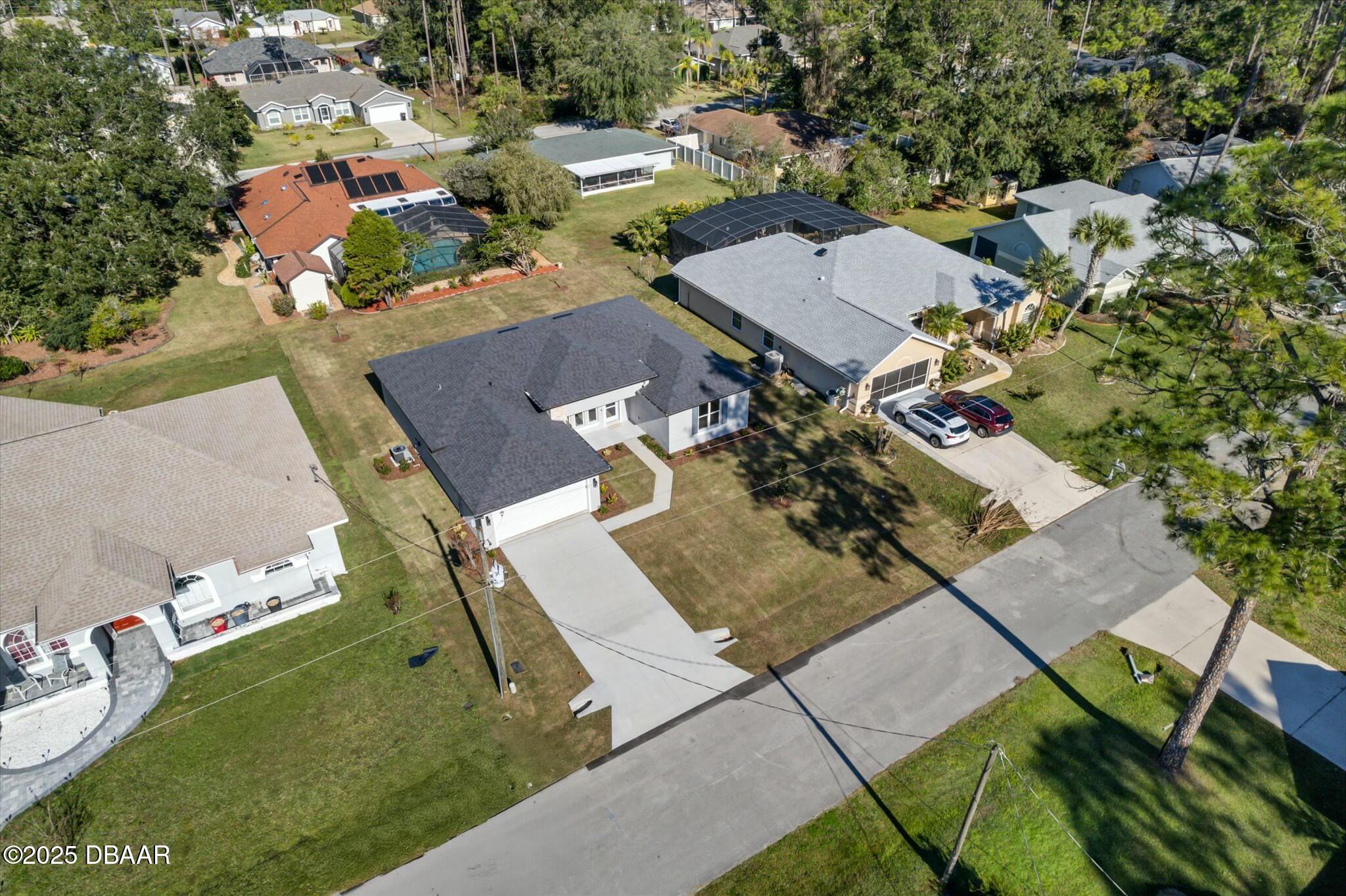 2 Seamanship Trail Palm Coast, FL 32164 - Photo 2 of 38 an aerial view of a house with a yard