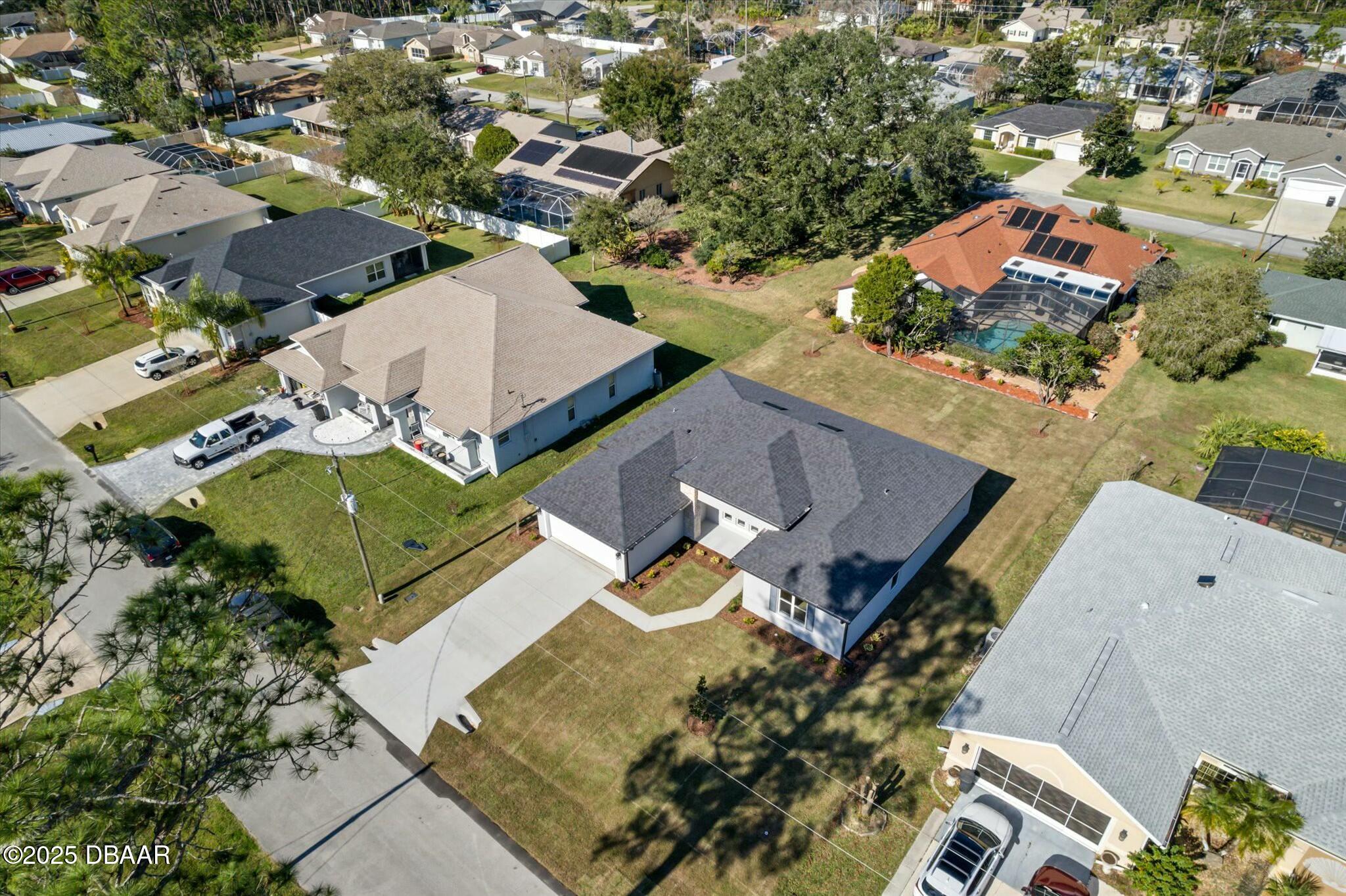 2 Seamanship Trail Palm Coast, FL 32164 - Photo 8 of 38 an aerial view of a house with a garden