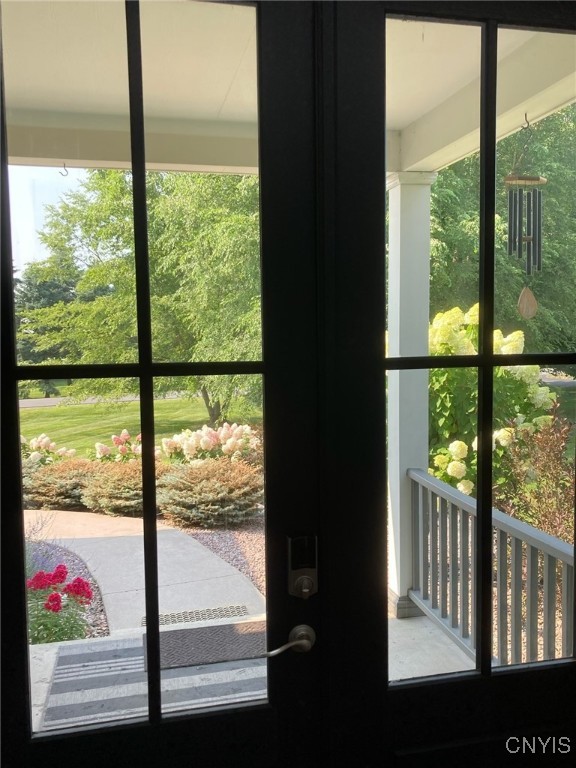 21277 Fox Ridge Road Watertown Town, NY 13601 - Photo 42 of 50 View of front porch 8/24 when flowers in bloom