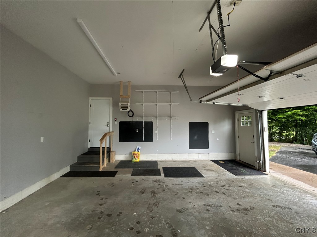 21277 Fox Ridge Road Watertown Town, NY 13601 - Photo 47 of 50 Garage attached to house/heater on wall