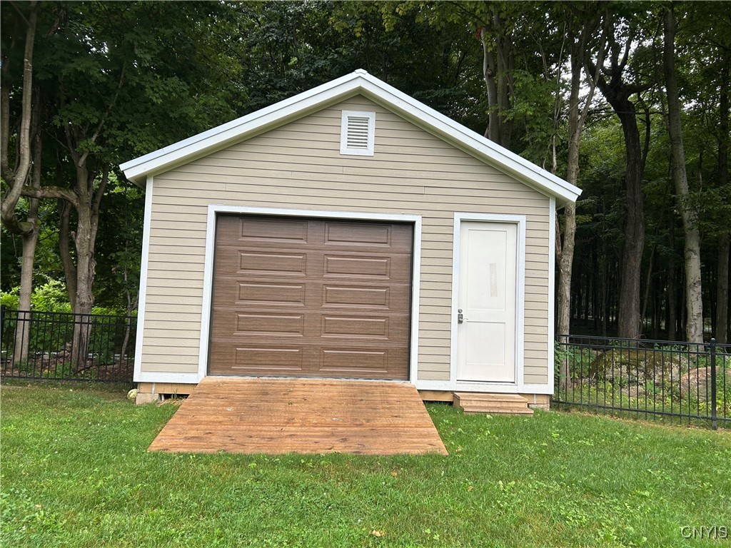 21277 Fox Ridge Road Watertown Town, NY 13601 - Photo 48 of 50 Garage back yard 20' x 24" electric garage door op